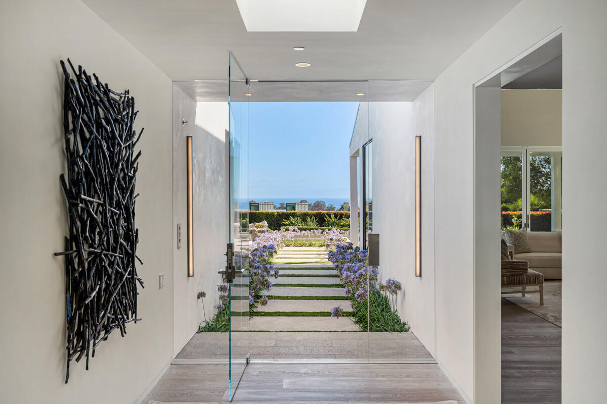 1850 Jelinda Drive Montecito, CA 93108 - Photo 7 of 50 a view of a hallway with wooden floor and a bathroom