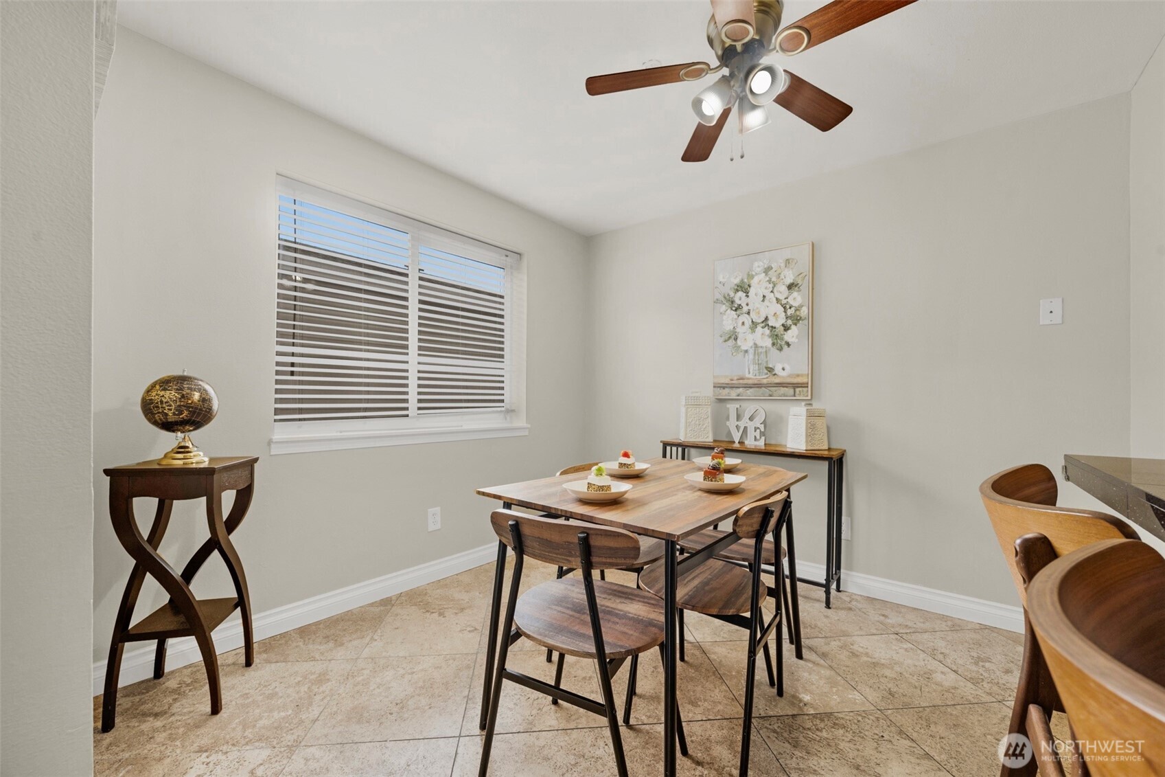 1001 West Casino Road, Unit B101 Everett, WA 98204 - Photo 9 of 19 a dining room with furniture and window