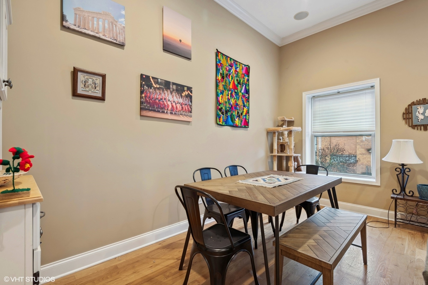 1116 East 46th Street, Unit 3W Chicago, IL 60653 - Photo 8 of 16 a view of a dining room with furniture and wooden floor