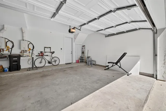 a view of a house with a yard and hanging chair