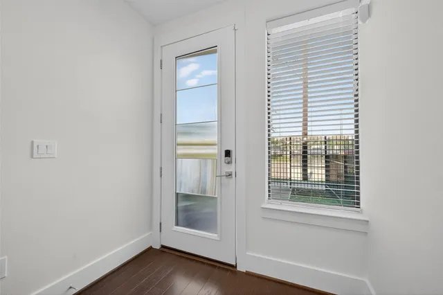 a bedroom with a bed and a table in it