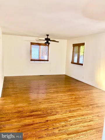 a view of a door and a window