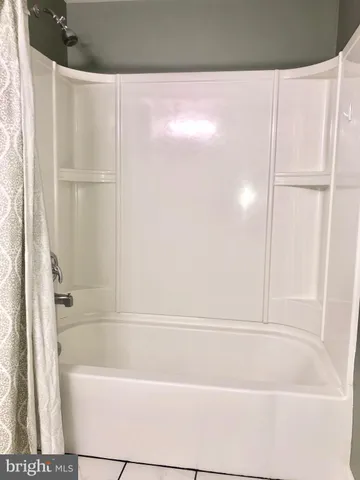 a bathroom with a bathtub