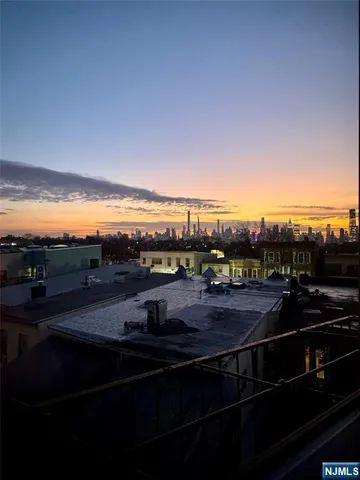 a view of a balcony with an ocean view
