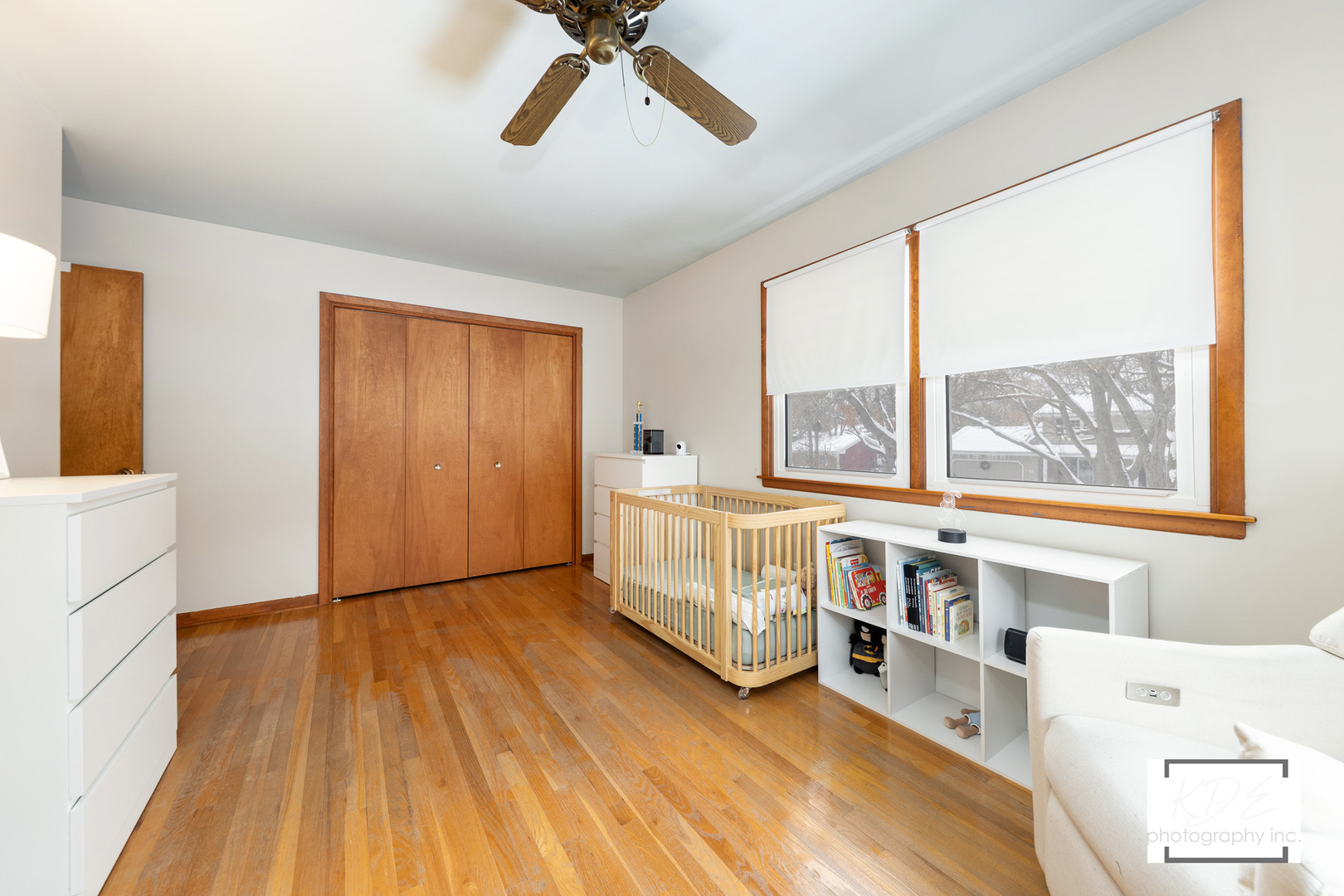 1236 Hercules Lane Naperville, IL 60540 - Photo 20 of 41 a view of a bedroom with baby bed and a window