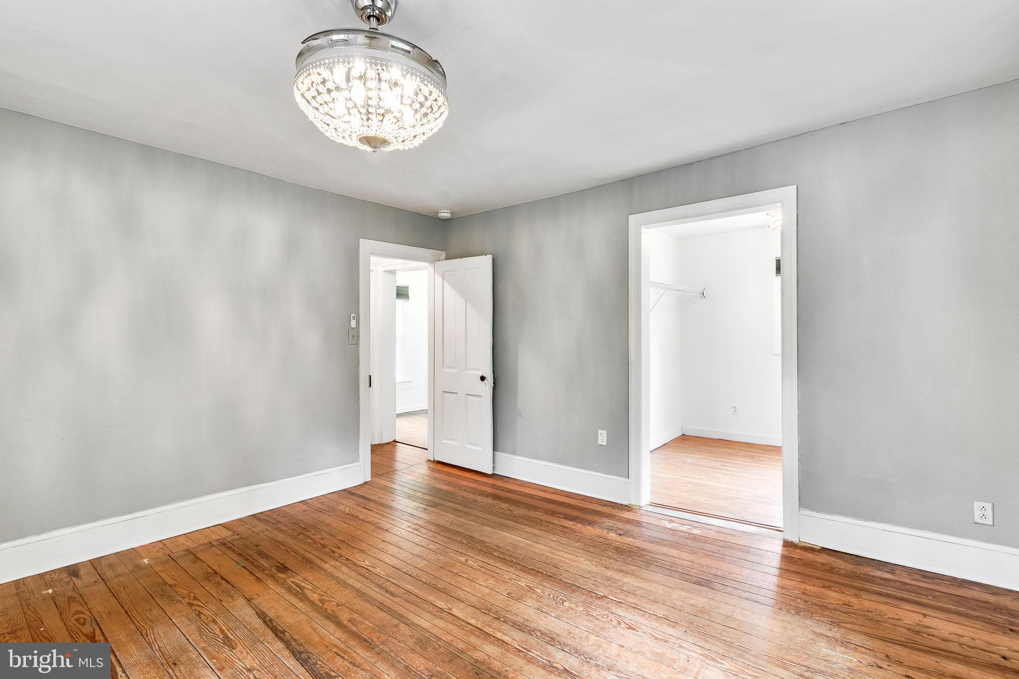3952 Irvington Road Irvington, VA 22480 - Photo 30 of 77 a view of an empty room with wooden floor