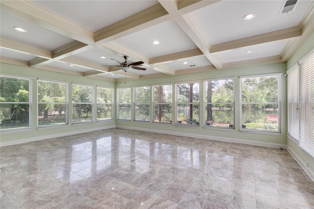 110 Pond View Point LaGrange, GA 30240 - Photo 22 of 65 a view of an empty room with wooden floor and a window