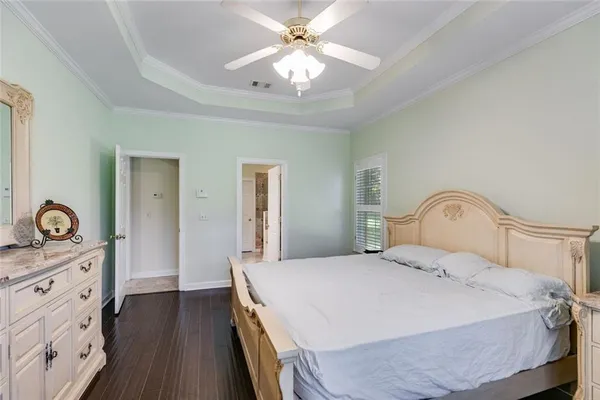 an empty room with windows and entrance