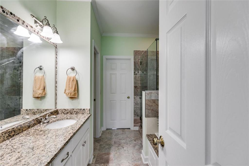 110 Pond View Point LaGrange, GA 30240 - Photo 28 of 65 a bathroom with a granite countertop sink and a mirror
