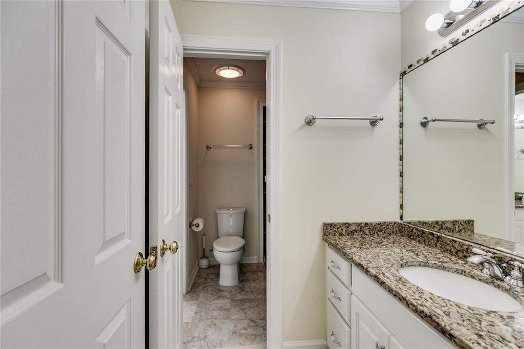 110 Pond View Point LaGrange, GA 30240 - Photo 49 of 65 a bathroom with a granite countertop sink and a mirror