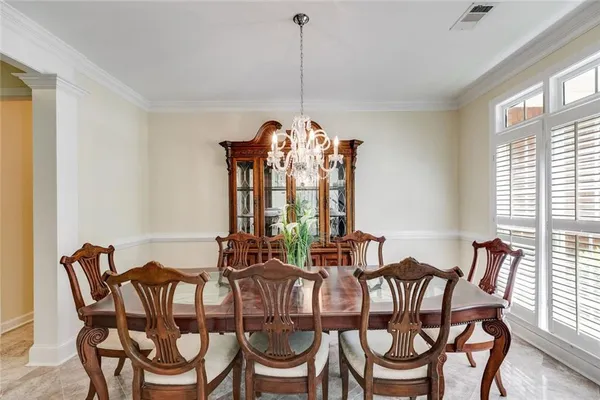 a view of a hallway with seating area