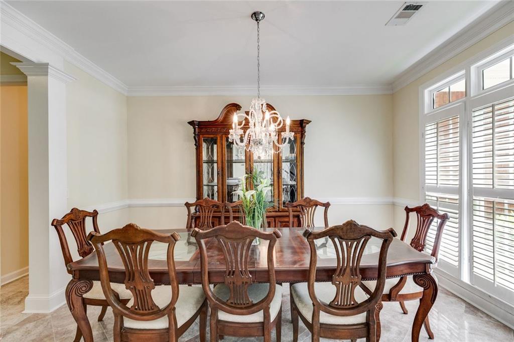 110 Pond View Point LaGrange, GA 30240 - Photo 8 of 65 a view of a dining room with furniture window and outside view