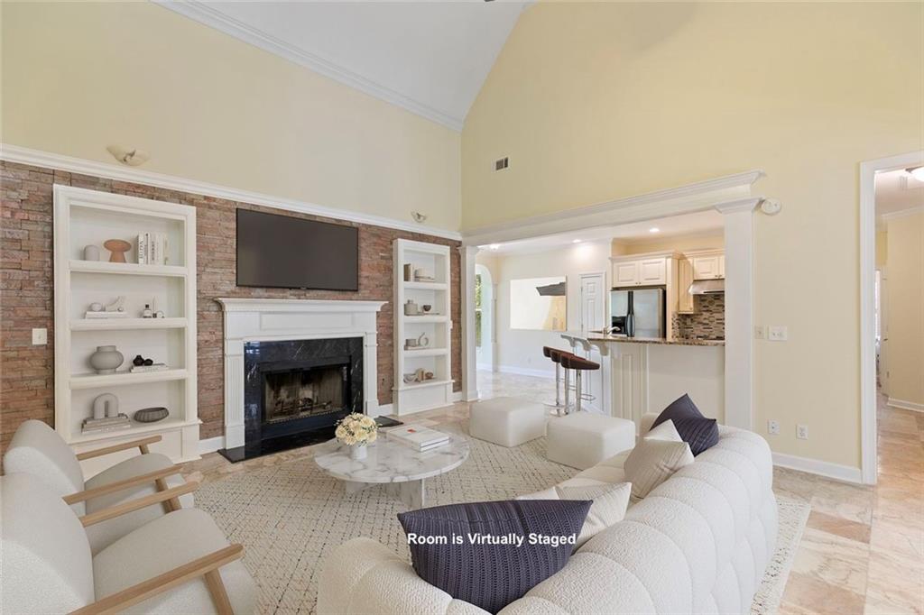 110 Pond View Point LaGrange, GA 30240 - Photo 10 of 65 a living room with furniture and a fireplace