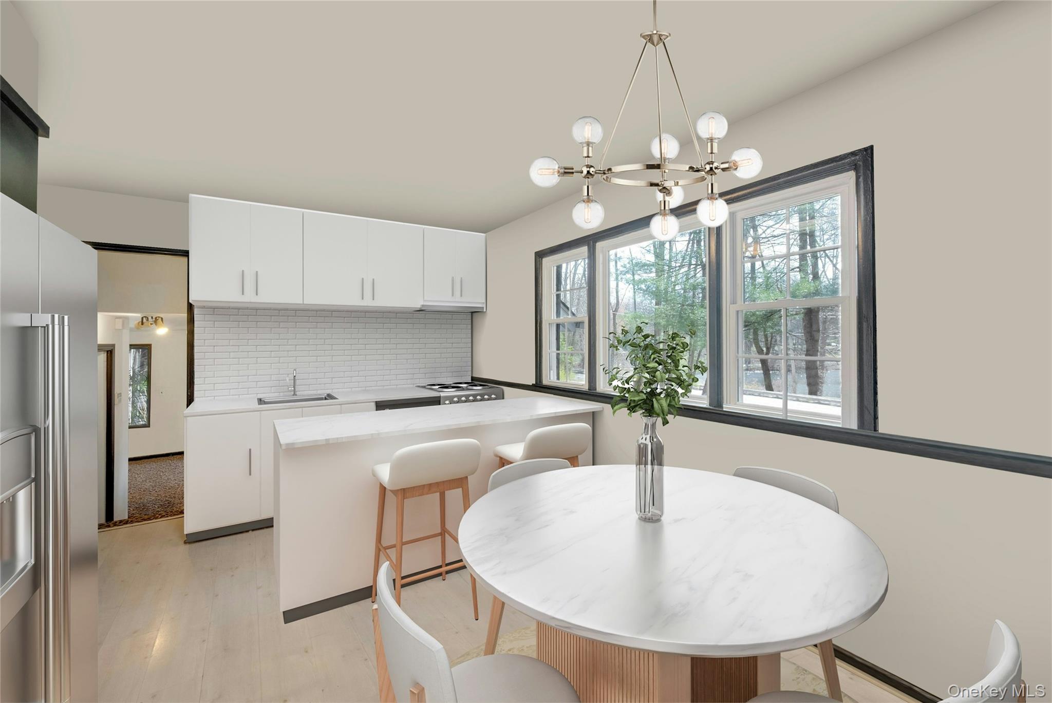 119 Goldens Bridge Road Katonah, NY 10536 - Photo 14 of 34 a kitchen with stainless steel appliances granite countertop a sink a stove a refrigerator and island with wooden floor
