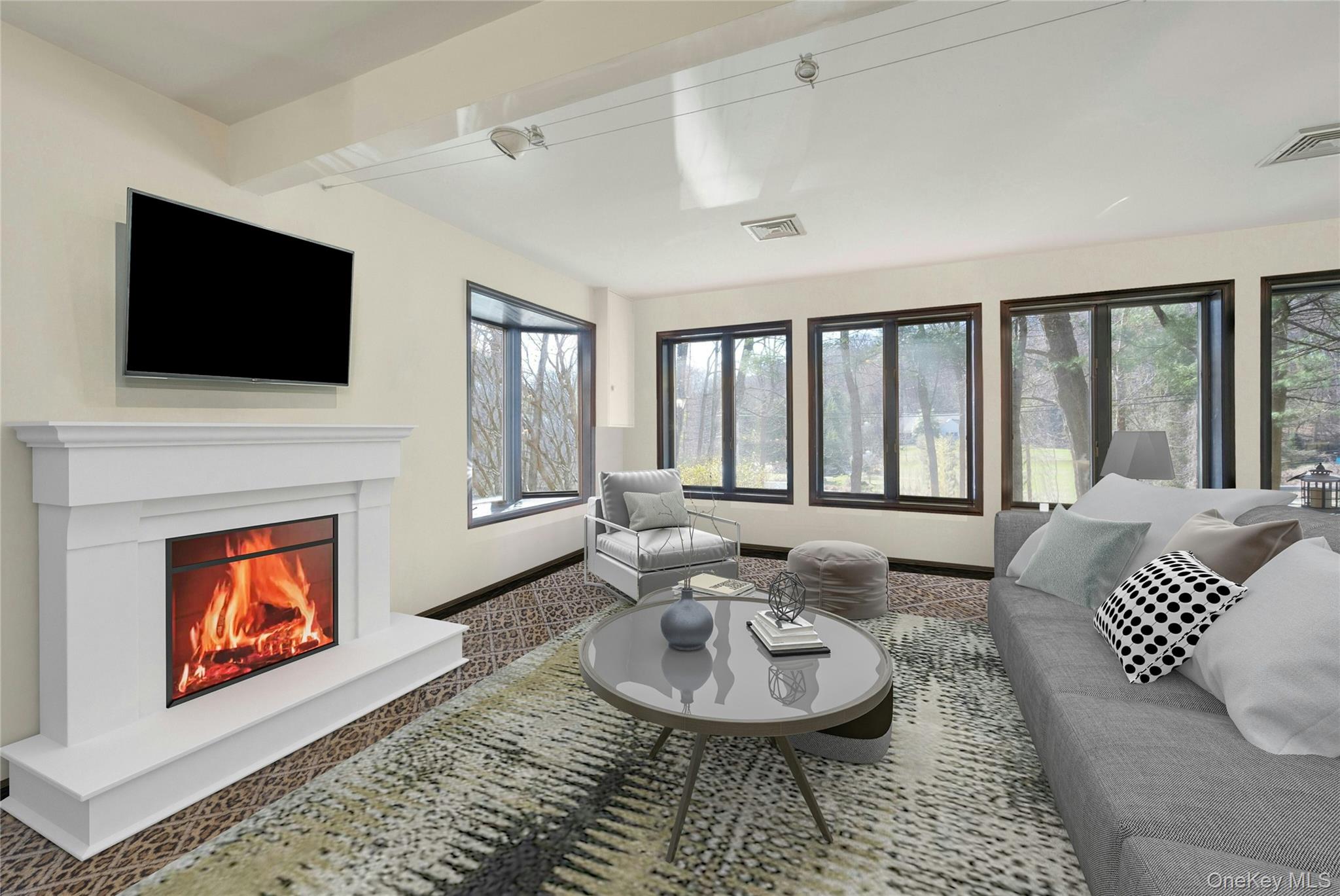 119 Goldens Bridge Road Katonah, NY 10536 - Photo 18 of 34 a living room with fireplace furniture and a flat screen tv