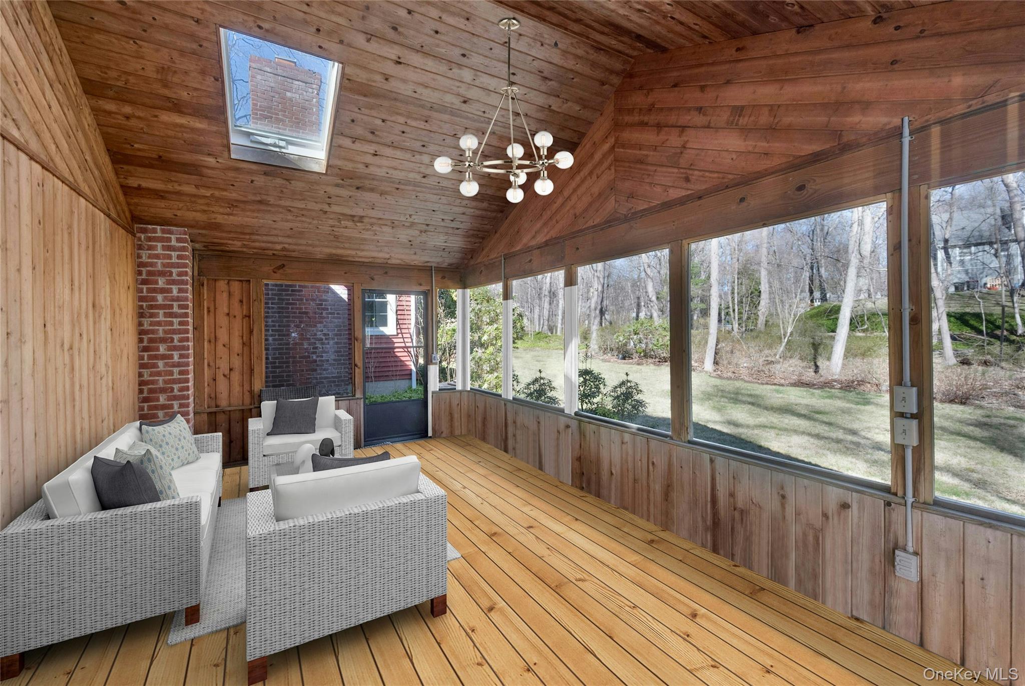 119 Goldens Bridge Road Katonah, NY 10536 - Photo 20 of 34 a living room with furniture and a large window