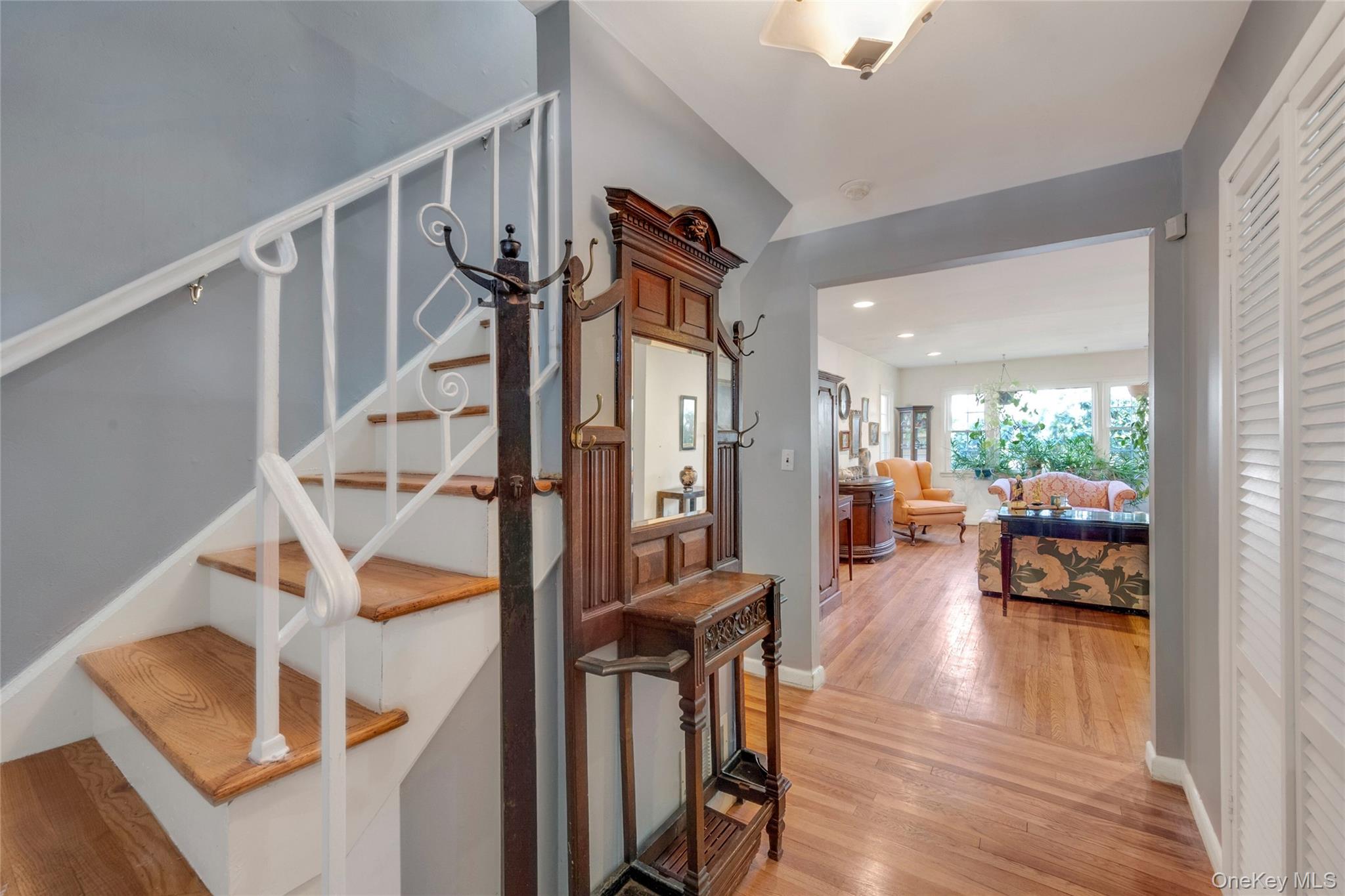 119 Goldens Bridge Road Katonah, NY 10536 - Photo 2 of 34 a living room with furniture and a wooden floor