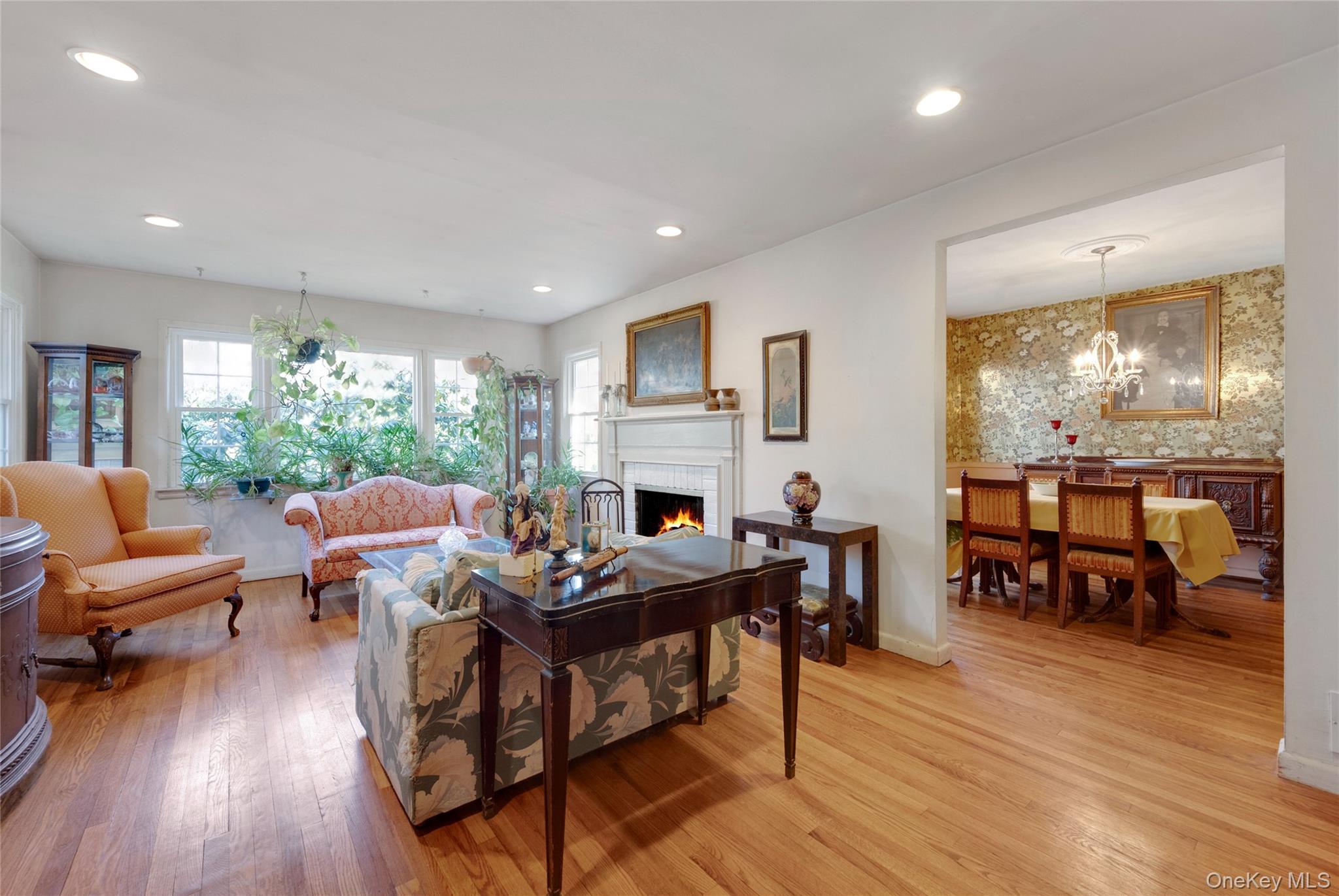 119 Goldens Bridge Road Katonah, NY 10536 - Photo 5 of 34 a living room with furniture and a fireplace