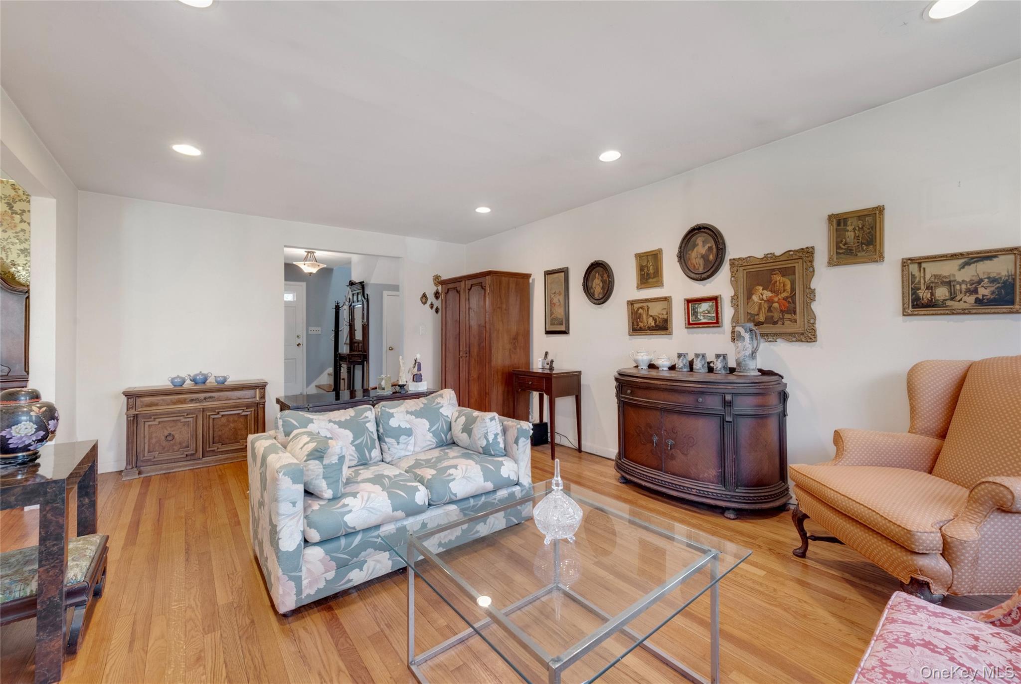 119 Goldens Bridge Road Katonah, NY 10536 - Photo 7 of 34 a living room with furniture and a flat screen tv