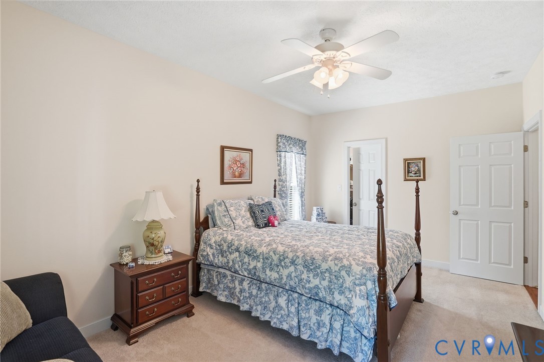 3600 Market Road Mechanicsville, VA 23111 - Photo 39 of 67 a bedroom with a bed and dresser