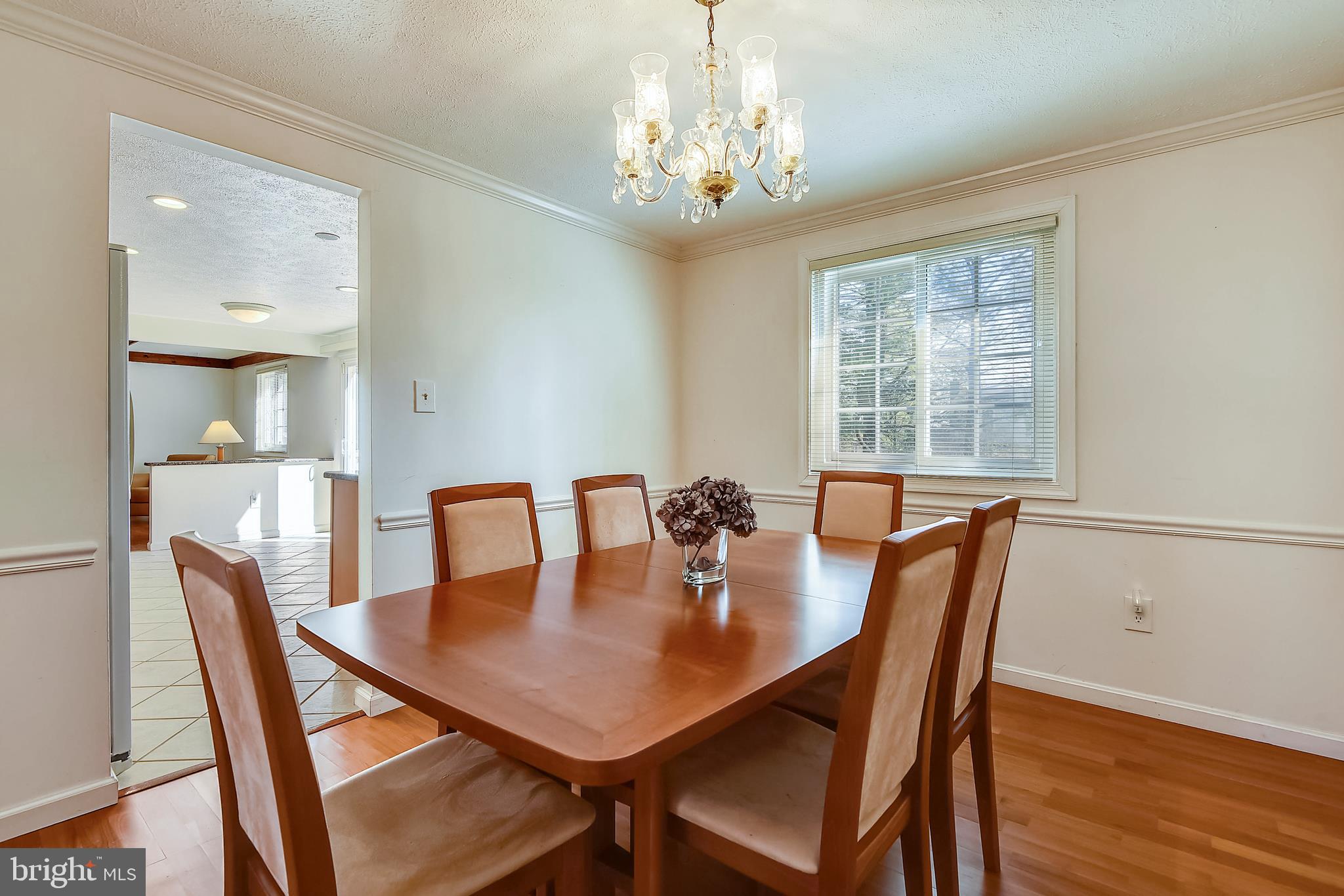 9401 Huntmaster Road Laytonsville, MD 20882 - Photo 11 of 56 Formal dining room opens into the kitchen