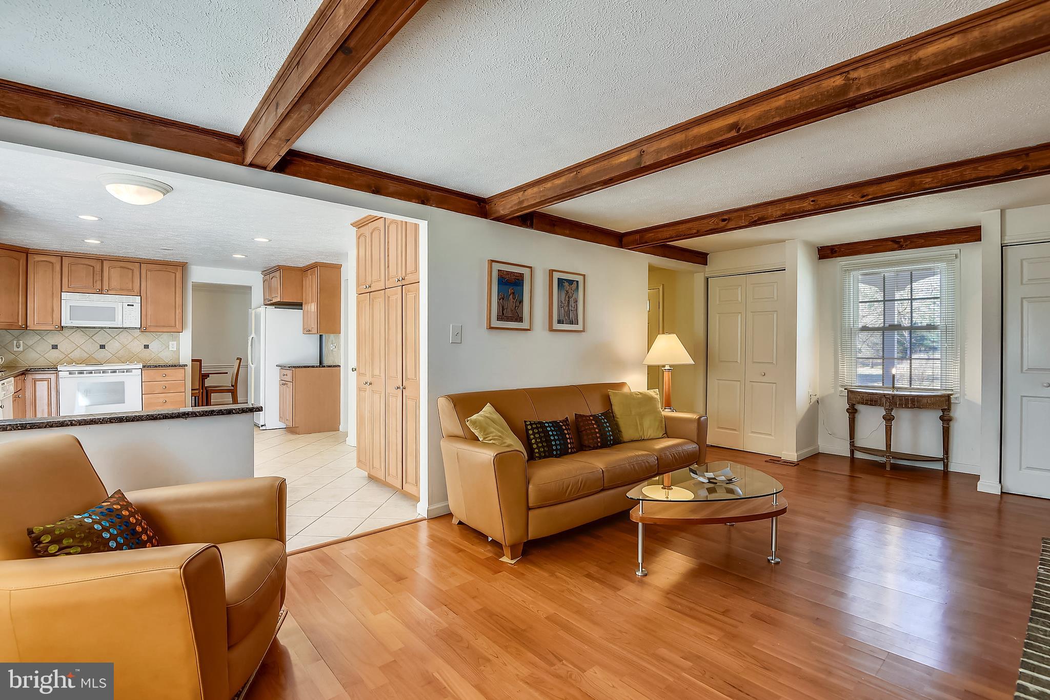 9401 Huntmaster Road Laytonsville, MD 20882 - Photo 20 of 56 Large family room has beamed ceiling