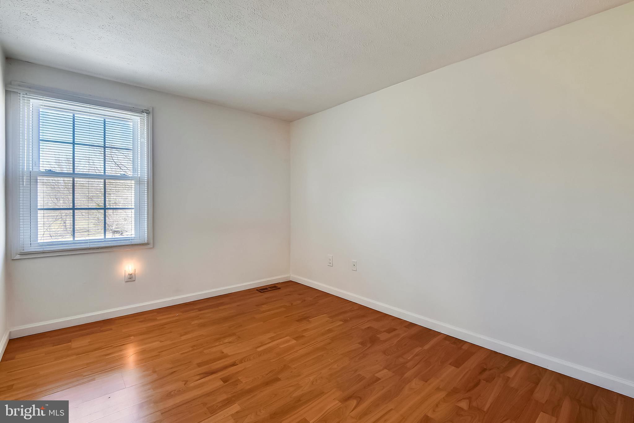 9401 Huntmaster Road Laytonsville, MD 20882 - Photo 36 of 56 Bedroom #5 has hardwood floor