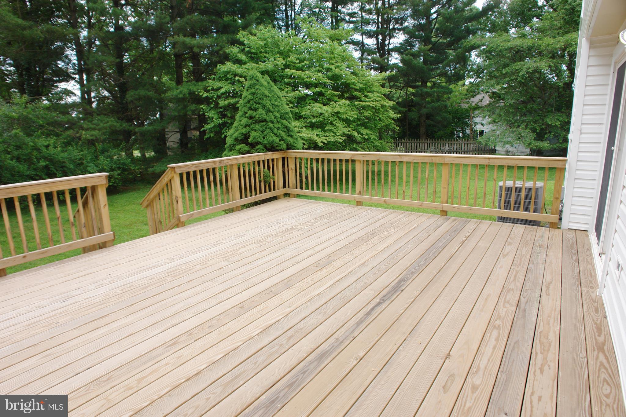 9401 Huntmaster Road Laytonsville, MD 20882 - Photo 49 of 56 Brand new deck overlooks the spacious backyard