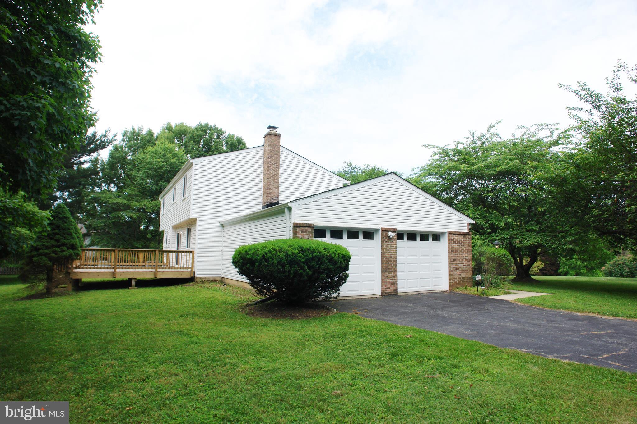 9401 Huntmaster Road Laytonsville, MD 20882 - Photo 5 of 56 Driveway leads to the 2-car side load garage
