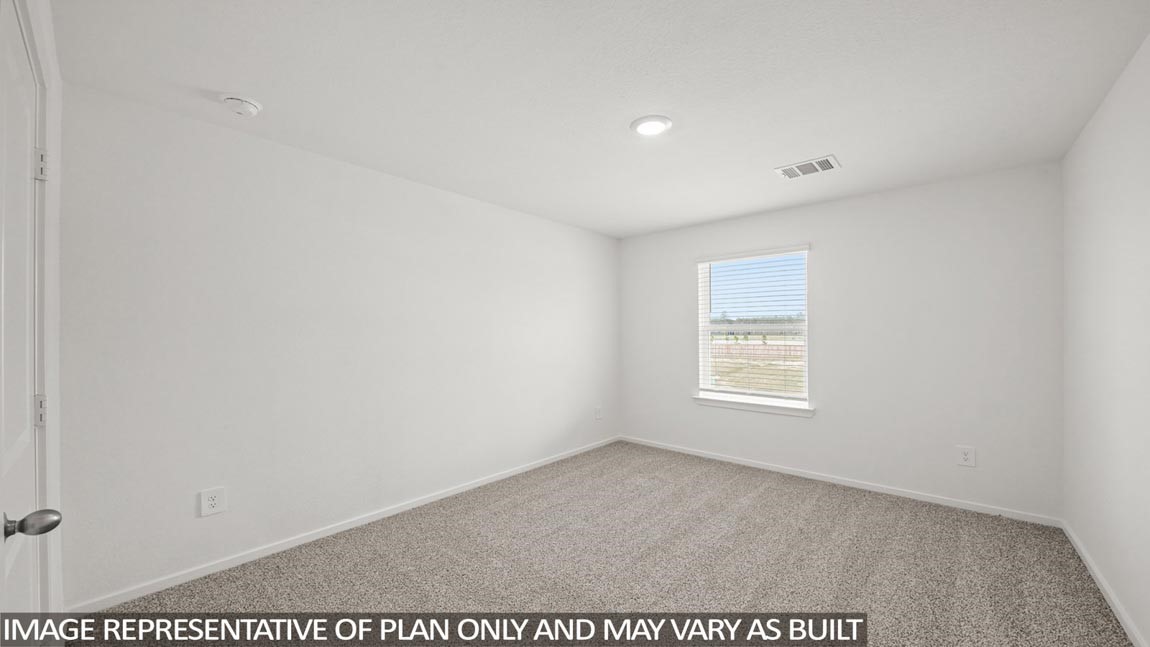 16763 Country Roots Avenue Conroe, TX 77302 - Photo 14 of 29 a view of an empty room with a window