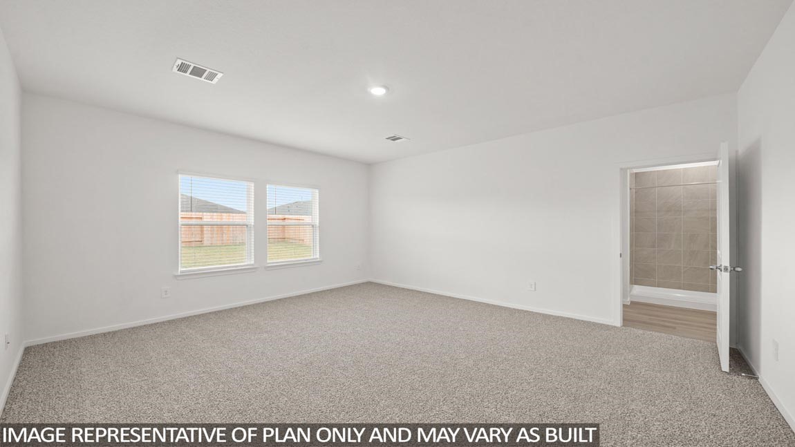 16763 Country Roots Avenue Conroe, TX 77302 - Photo 7 of 29 a view of an empty room with a window