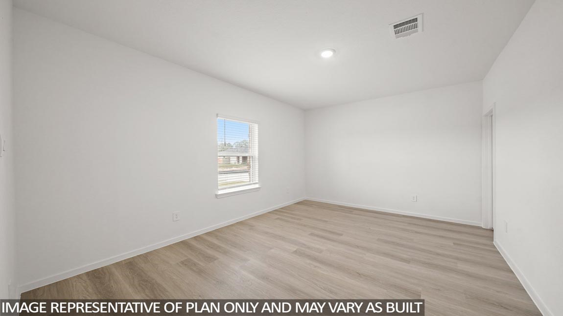 16763 Country Roots Avenue Conroe, TX 77302 - Photo 10 of 29 a view of an empty room and window