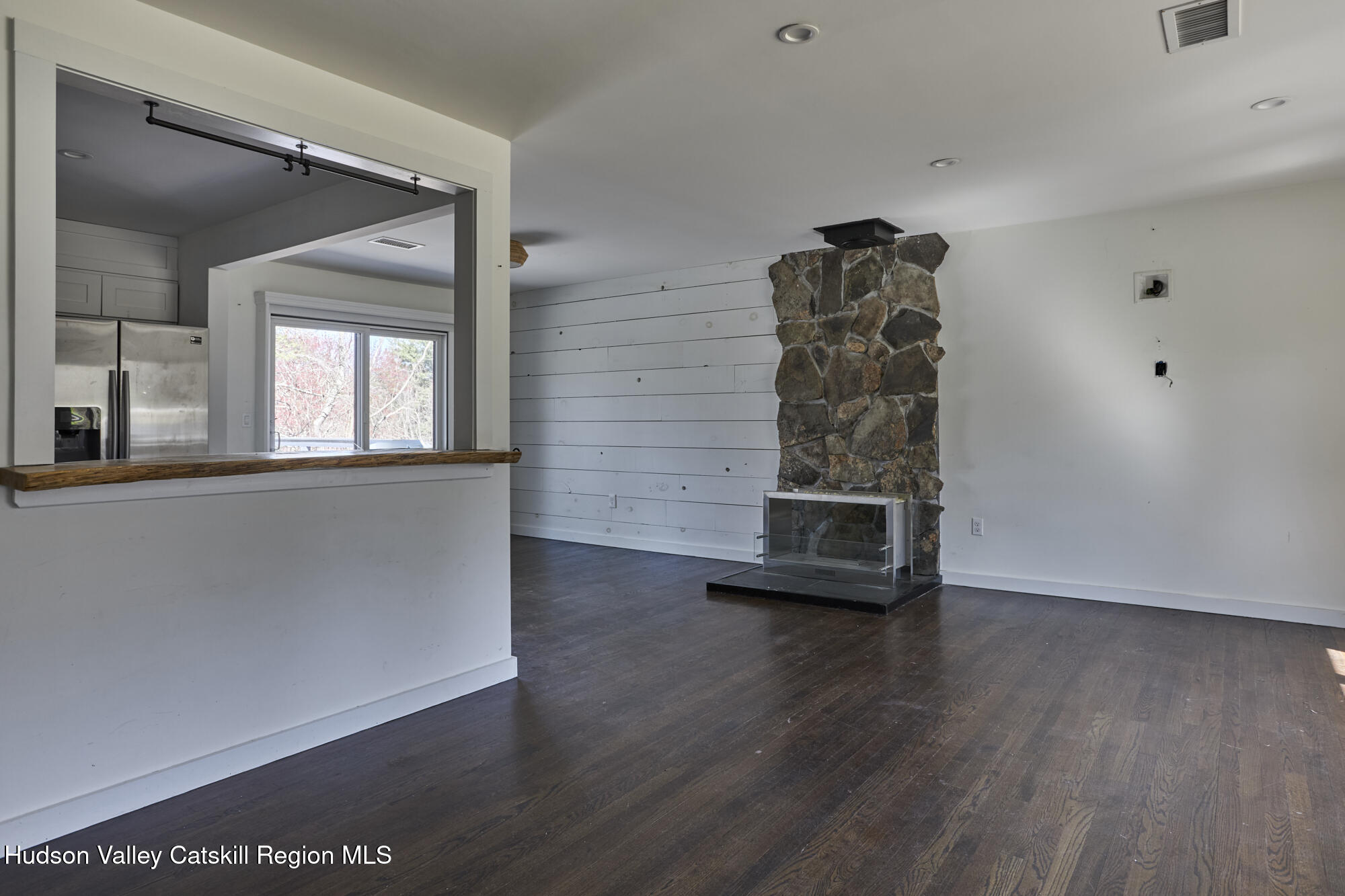 361 Allen Road Salt Point, NY 12578 - Photo 12 of 31 an empty room with wooden floor and windows