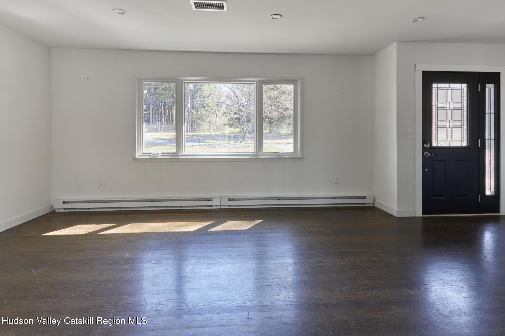 361 Allen Road Salt Point, NY 12578 - Photo 14 of 31 a view of a room with wooden floor and a window