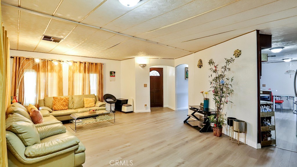 14300 Clinton Street, Unit 64 Garden Grove, CA 92843 - Photo 11 of 48 a view of a room with furniture and large window