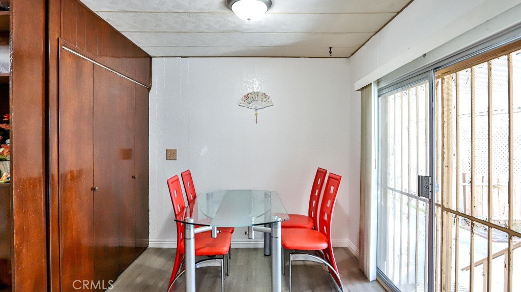 14300 Clinton Street, Unit 64 Garden Grove, CA 92843 - Photo 24 of 48 a view of a room with furniture and a window