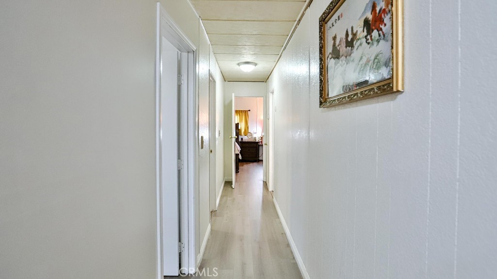 14300 Clinton Street, Unit 64 Garden Grove, CA 92843 - Photo 25 of 48 a view of a hallway