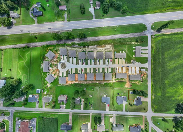 a view of a city with a lake