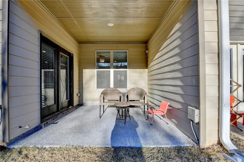 2230 Manor Pointe Drive Cumming, GA 30041 - Photo 40 of 53 a living room with furniture and a table