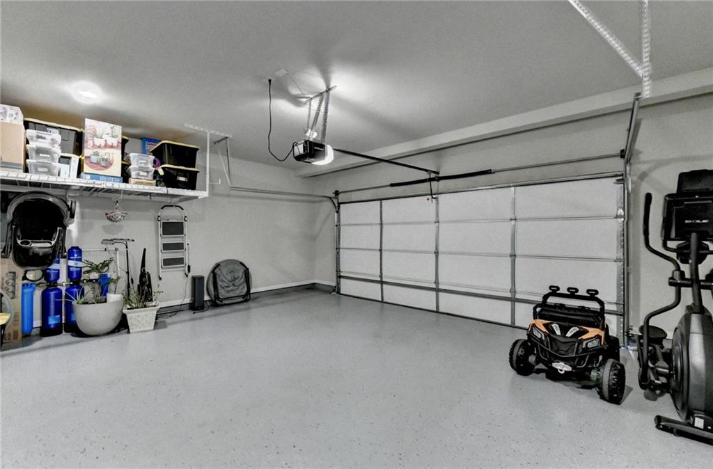 2230 Manor Pointe Drive Cumming, GA 30041 - Photo 45 of 53 a view of a room with gym equipment