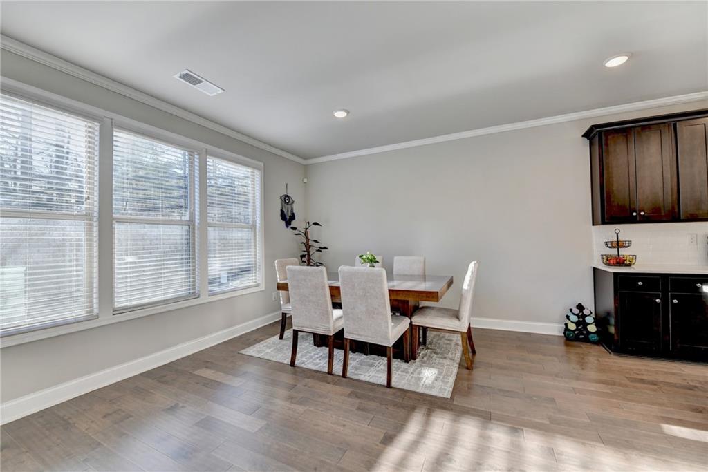 2230 Manor Pointe Drive Cumming, GA 30041 - Photo 8 of 53 a view of a work space with furniture and windows