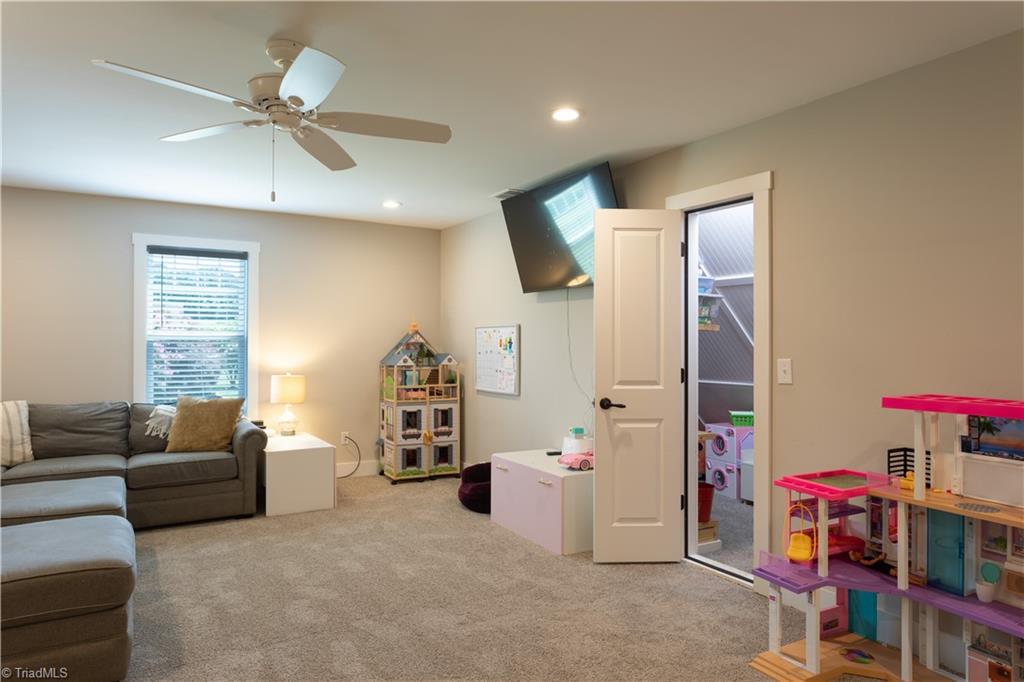 393 Scout Road Lexington, NC 27292 - Photo 44 of 47 Peek into the hideout closet. This space is currently used as a "play quarters" and is perfect for additional storage space.