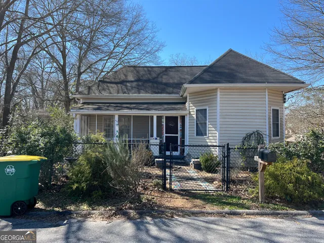 a front view of house with yard and seating area
