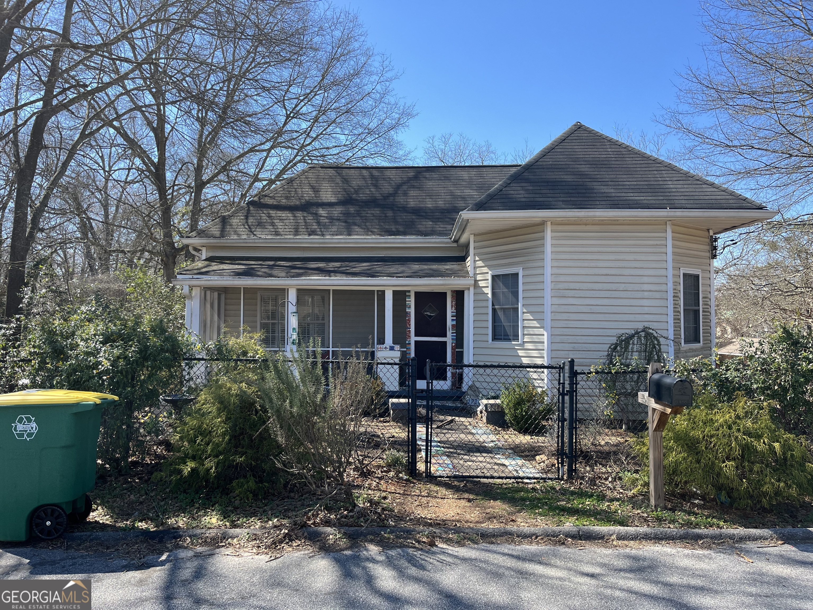 a front view of house with yard and seating area