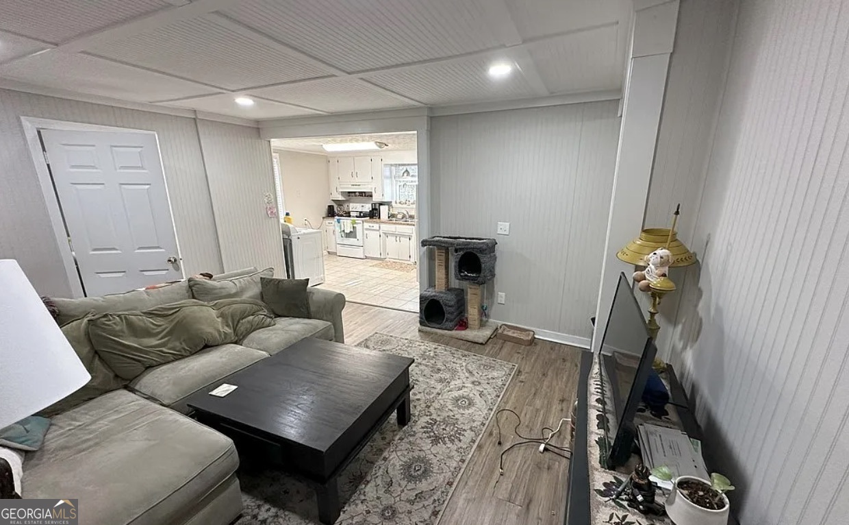 1734 East Broad Street Athens, GA 30601 - Photo 4 of 15 a living room with furniture and a fireplace