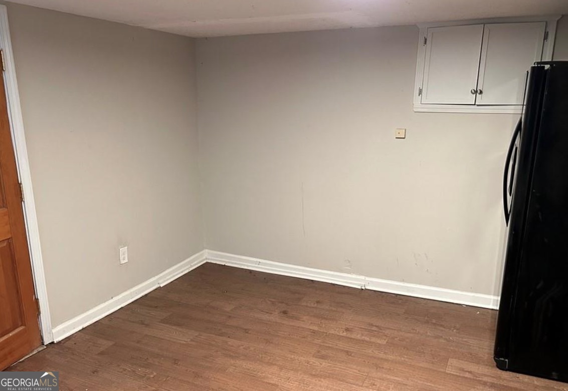 1734 East Broad Street Athens, GA 30601 - Photo 10 of 15 a view of a kitchen with wooden floor