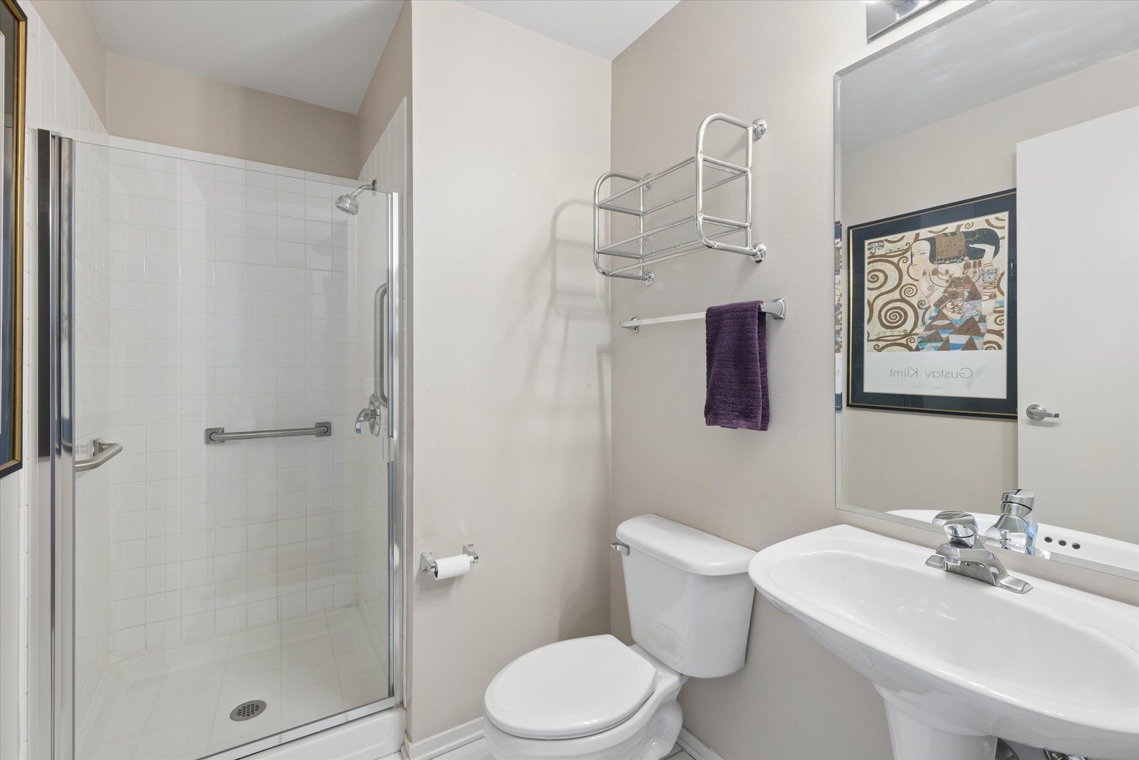 1530 South State Street, Unit 17R Chicago, IL 60605 - Photo 18 of 44 a bathroom with a sink toilet and shower