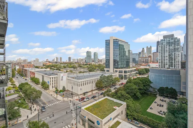 a view of a city with tall buildings