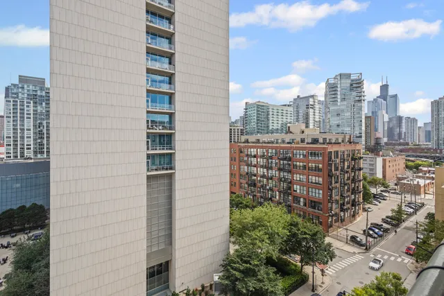 a view of a city with tall buildings