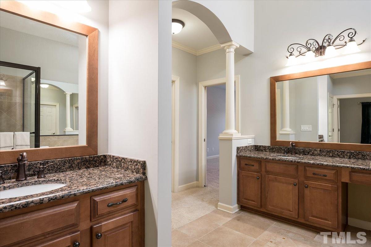 1917 Falls Farm Crossing Raleigh, NC 27614 - Photo 16 of 30 Oil Rubbed Hardware and Granite Counters complete this oversized master bath.